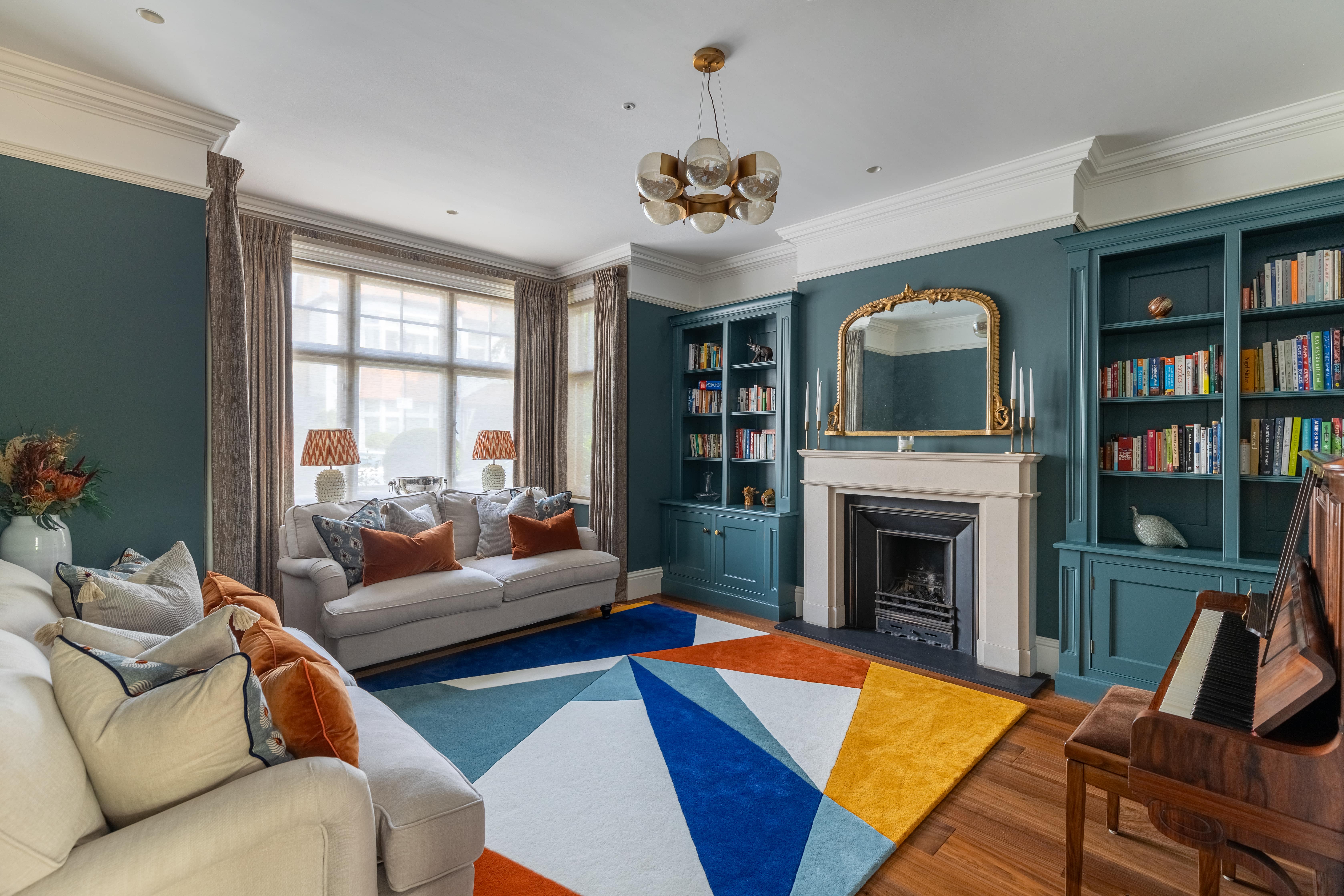 The living room in Chiswick House Location for Filming with two white sofas around the room
